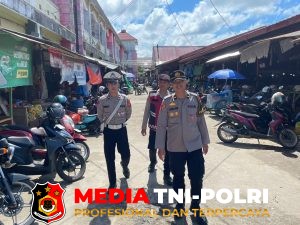 Pamapta II Polres Seruyan Gelar Patroli Objek Vital dan Dialogis di Pasar Saik Serta Perbankan