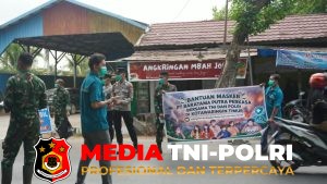 Kodim 1015/Spt Bersama Polres Kotim dan PT. Baratama Putra Perkasa Bagikan Ribuan Masker