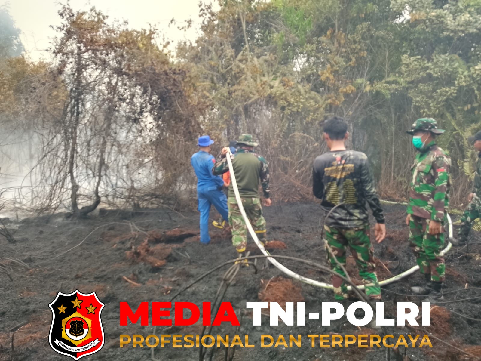 Kodim 1015/Sampit - Personel Kodim 1015/Sampit Gencarkan Pembasahan Pasca Karhutla