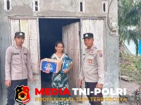 Polsek Hanau - Berbagi Rezeki, Polsek Hanau Salurkan Bansos untuk Warga di Pembuang Hulu