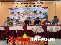 Bhabinkamtibmas - Hadir di Syukuran HUT ke-19 Desa Sungai Undang, Bhabinkamtibmas Ajak Warga Jaga Kebersamaan